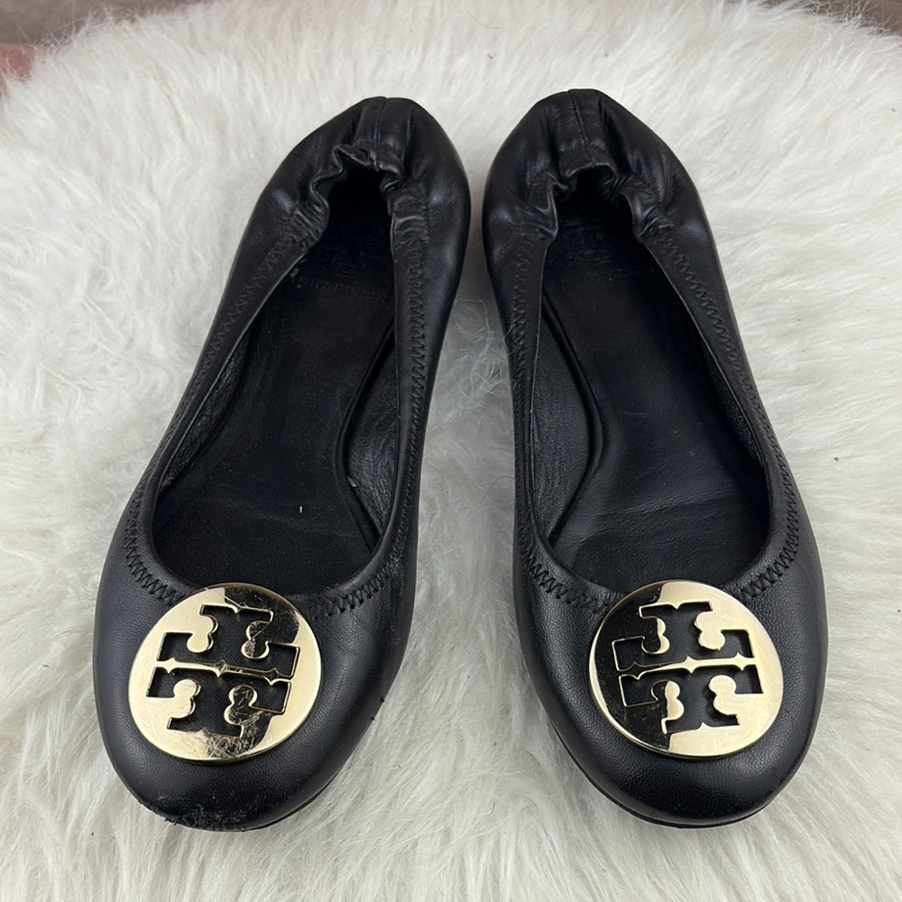 Tory Burch Black and Gold Flats with Signature Medallion